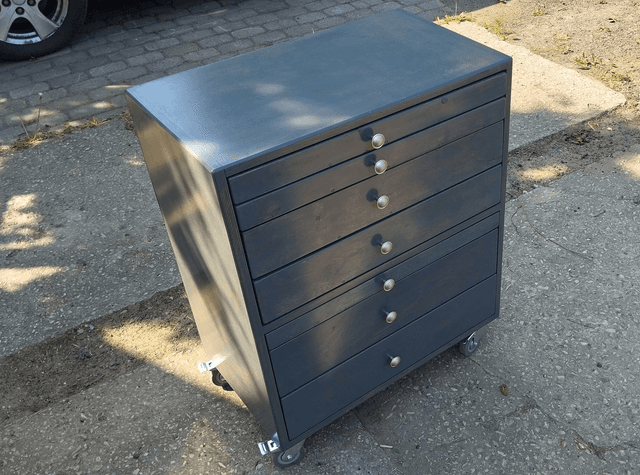 Blueberry black trolley cart outside in the sun
